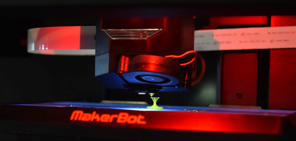 A 3-D printer at work at Faculty Technology Day. Photo by Dana Maxson