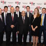 WFUV sports producer Bob Ahrens, center, was honored with a special tribute featuring award-winning student staff.