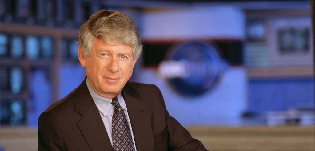 Ted Koppel in suit and tie on set of ABC news