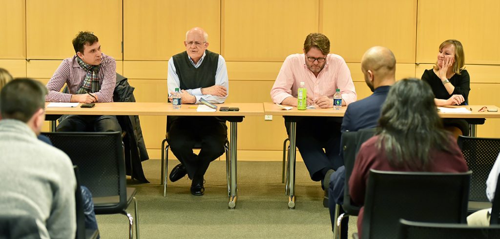 Michael Pirson, David Gautschi, Paul Johnson, and Julita Haber seated at a table at Fordham Law School