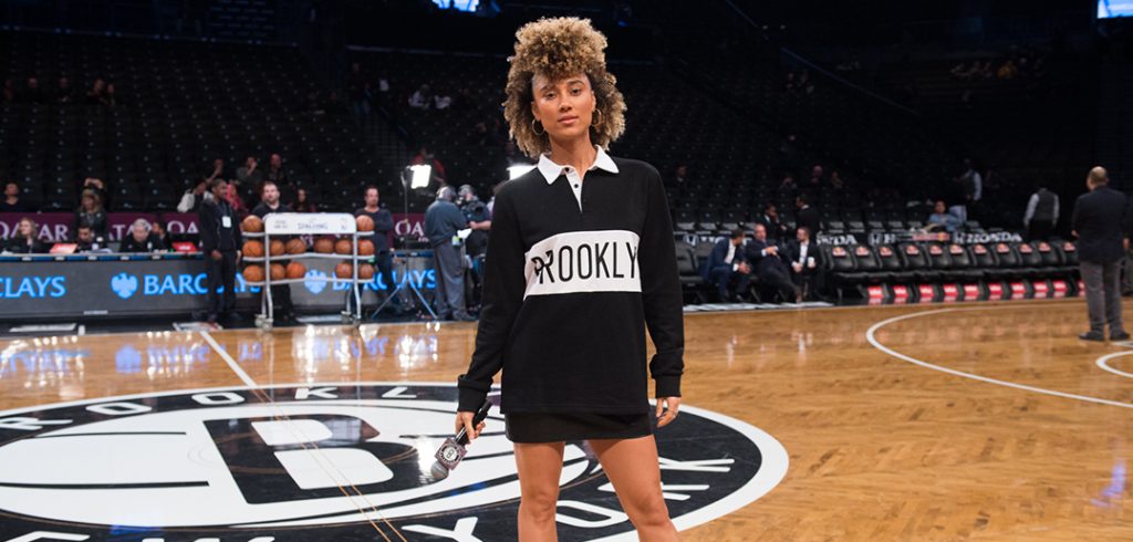 Ally Love hosting a Nets game at Barclays Center.