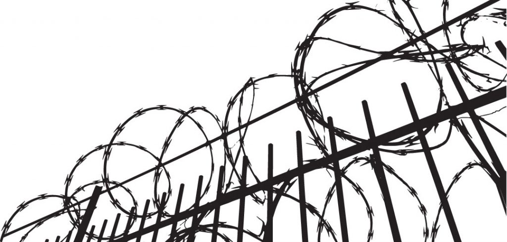 Line drawing of fence topped by razor wire