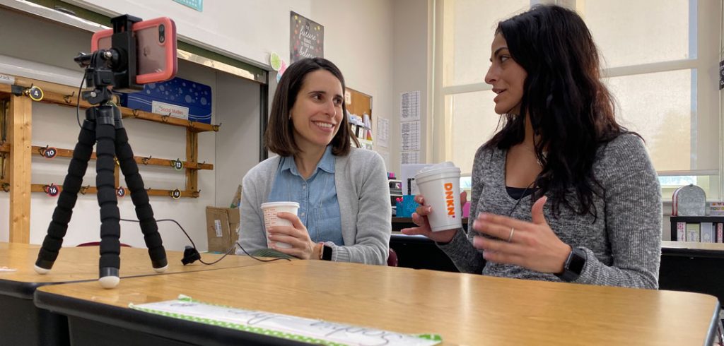 Two teachers talk for a video series