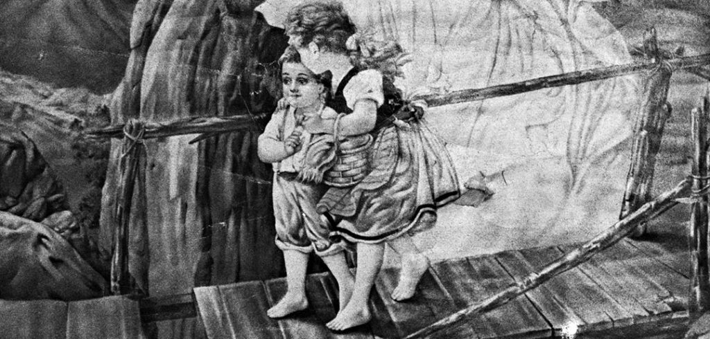 Detail of a black-and-white photo of an image of two children crossing a rickety bridge