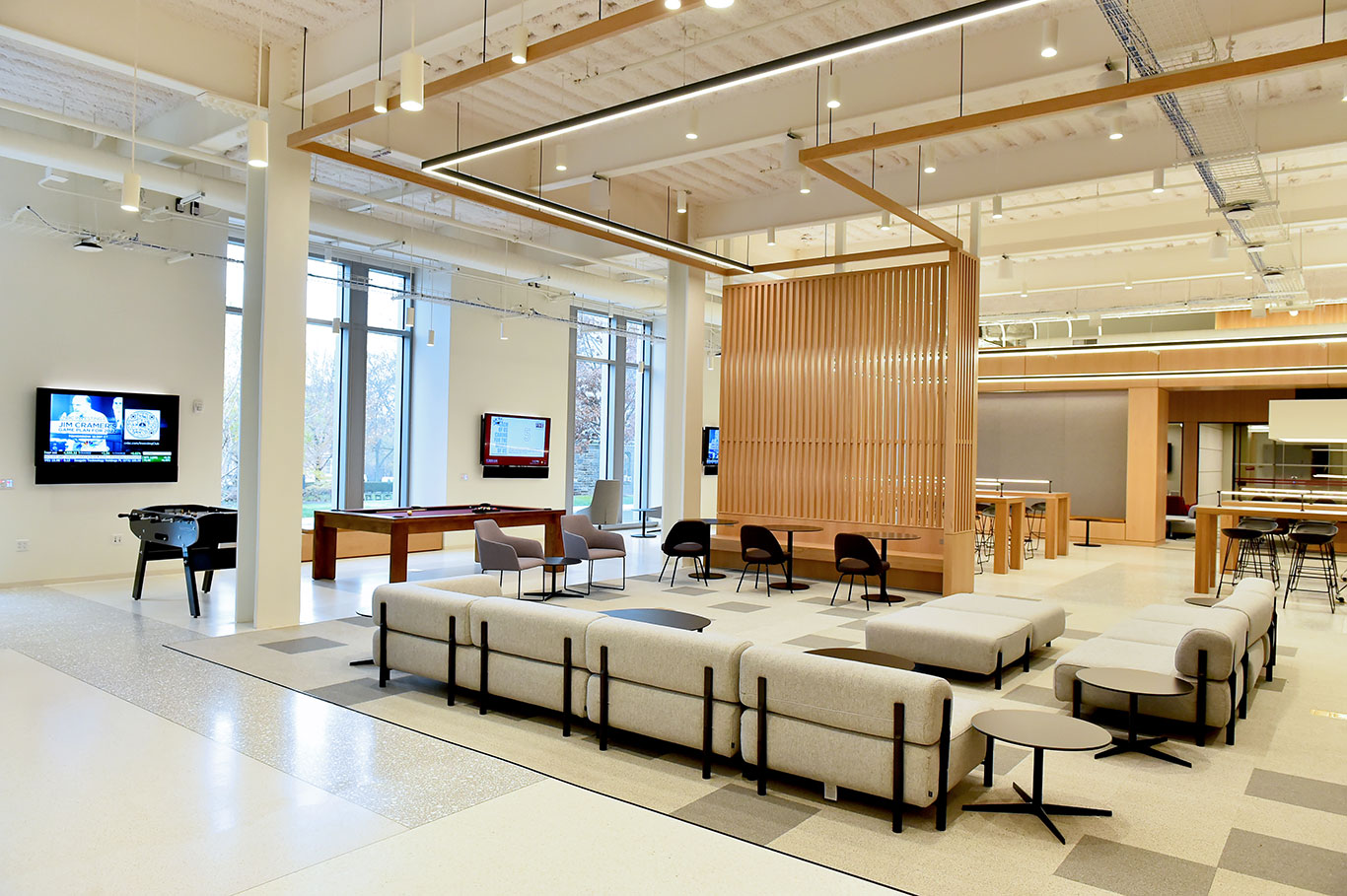 Couches, chairs and tables in the student lounge