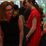 President Tetlow chatting with Jesuit priest at reception