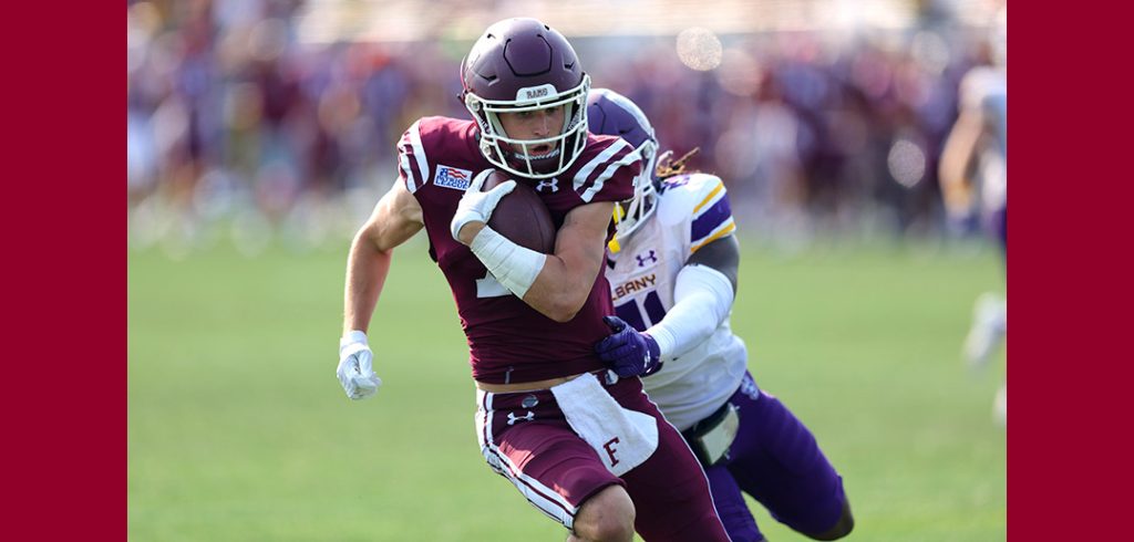 Garrett Cody, a Fordham College at Rose Hill senior, runs the ball during the Rams’ Sept. 17 Homecoming game against the University at Albany, which Fordham won 48-45.