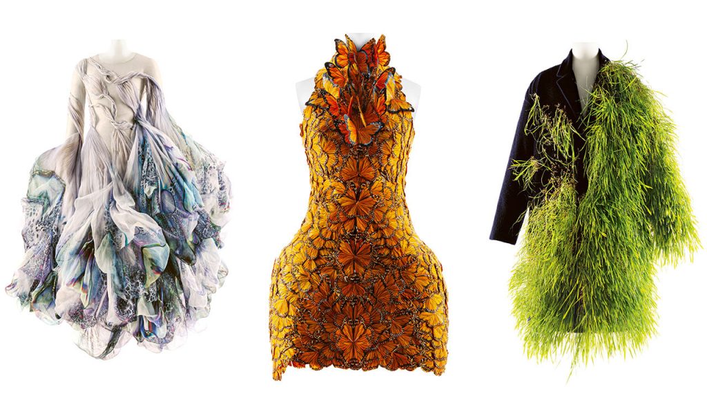 3 MET garments next to each other. White with ruffles (left) orange butterflies (center) and green furry blazer (right)