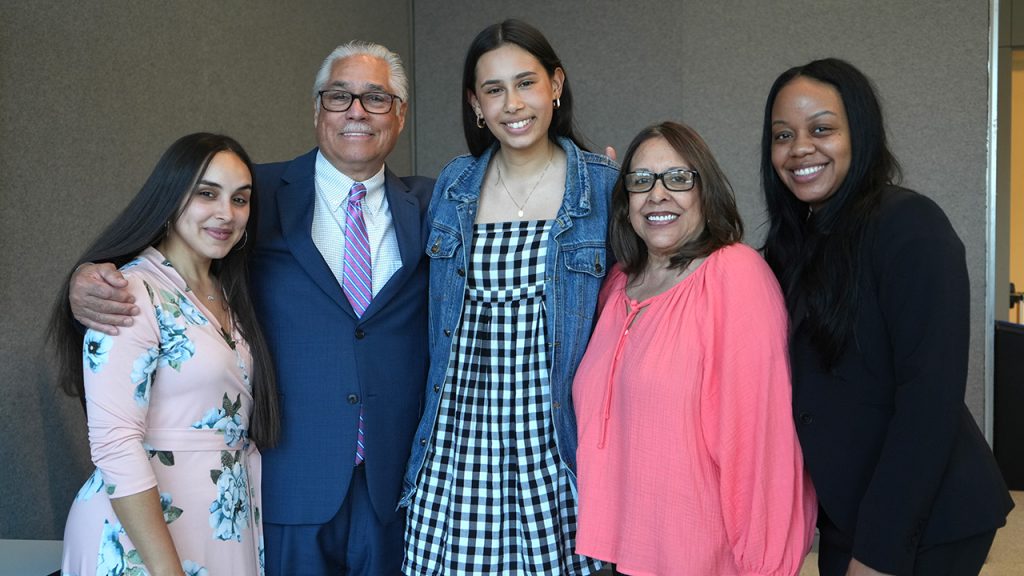 First-year student Mackenzie Saenz De Viteri, who won acceptance to the Fulbright U.K. Summer Institute, center, with (from left) CSTEP assistant director Michelle Santana, director Michael Molina, De Viteri’s grandmother, and CSTEP assistant director Shantay Owens