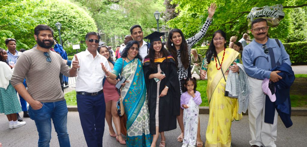 A family celebrates after graduation