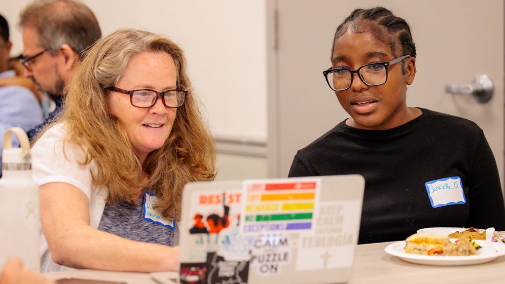 Fordham professor Jeannine Hill Fletcher and Suvante Oates, a Bronxdale High School student, at the June 4 launch of the Demystifying Language Project's website.