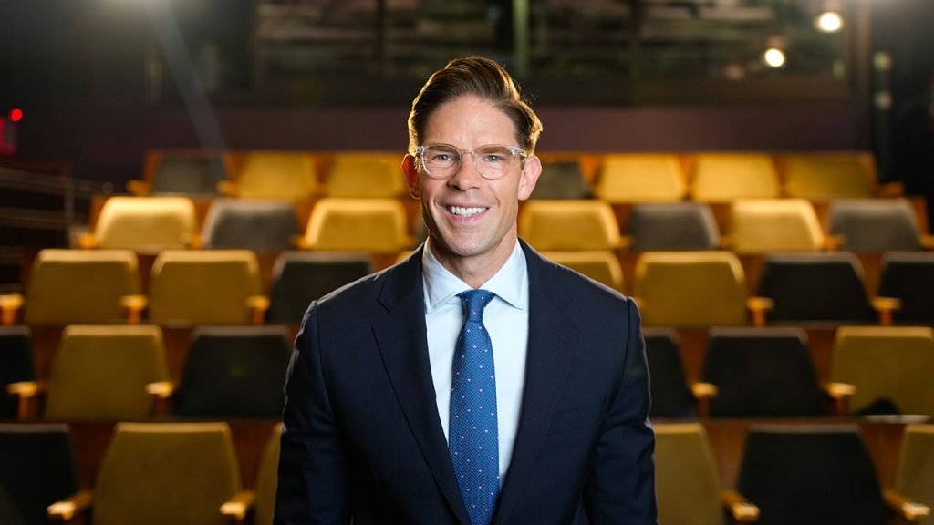 Frank DiLella poses in a theater.