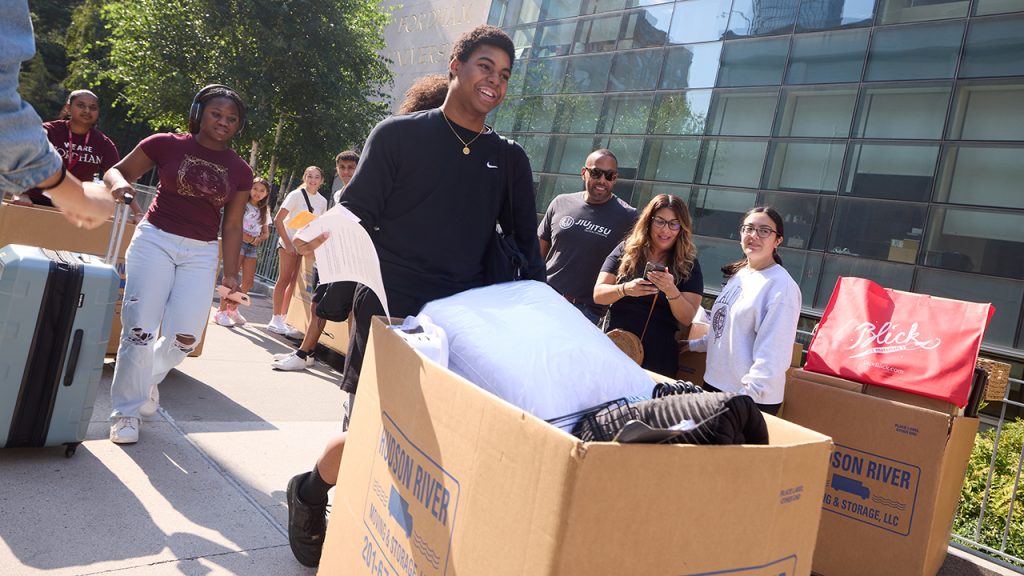 A student moving in at the Lincoln Center campus on August 25.