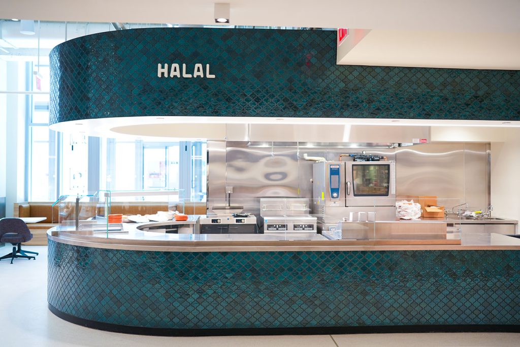 A kitchen with the sign halal above it