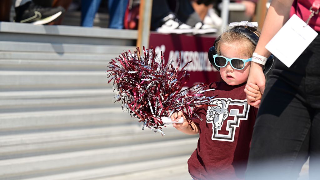 A young Fordham fan takes her seat at Moglia stadium.