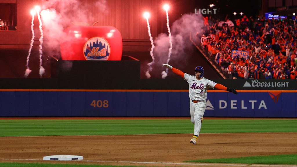 Francisco Alvarez of the New York Mets rounds the bases on Francisco Lindor's grand slam home run during the sixth inning in Game 4 of the NLDS against the Philadelphia Phillies at Citi Field in Flushing, N.Y., on October 9, 2024. (Photo by Gordon Donovan/NurPhoto via AP)