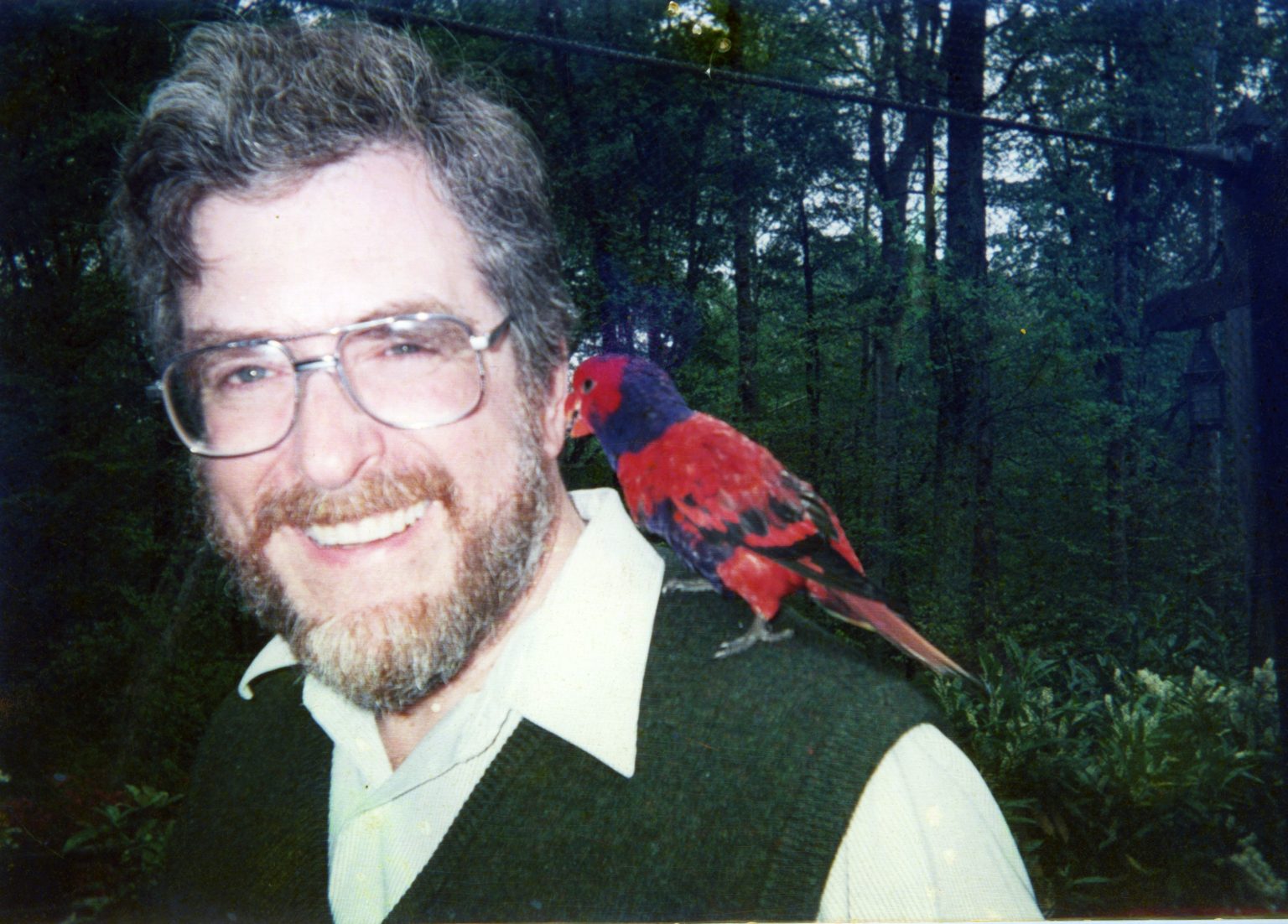 Alan M. Trevithick, Fordham Anthropology Professor, with a bird on his shoulder.