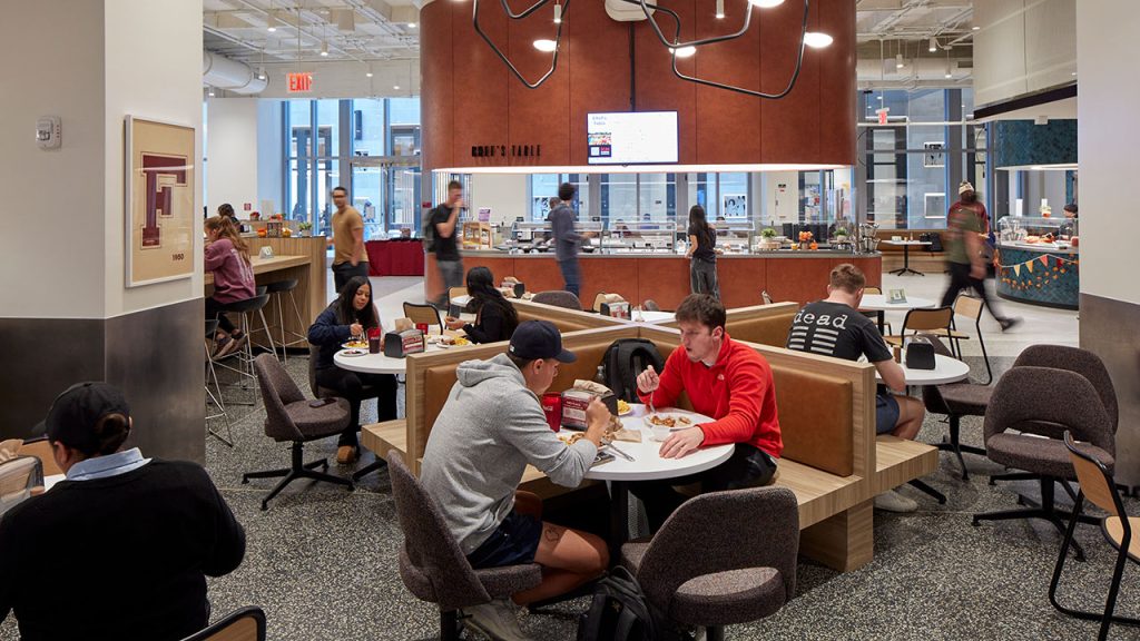 Students gather and eat in Fordham's new marketplace.