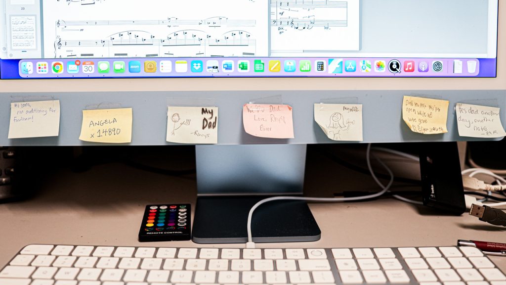 The bottom of a computer screen covered with Post-its