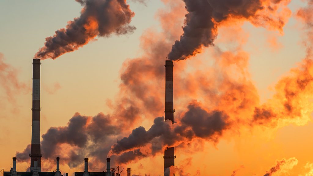 Smokestacks spewing smoke