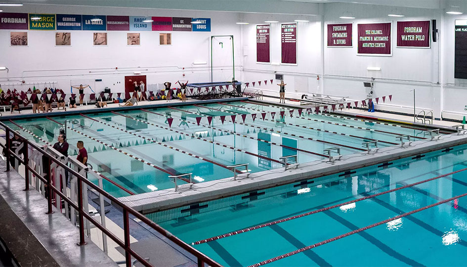 a swimming pool surrounded by people