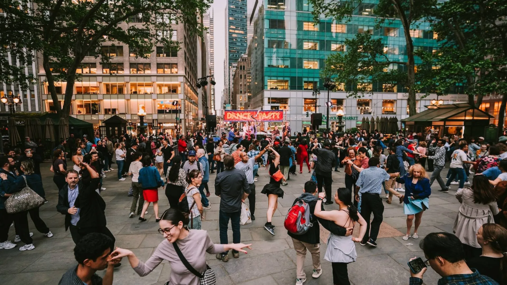 Huge crowd of people dancing at the Bryant Park dance party 