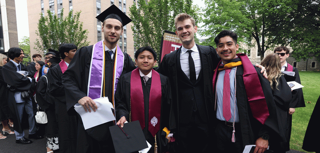 A group of grads at Fordham's commencement ceremony