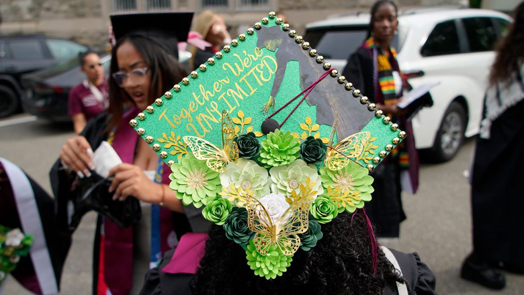 ‘Together We’re Unlimited’: Students Celebrate with Commencement Cap Artistry Commencement cap decorated with the message "Together We're Unlimited"