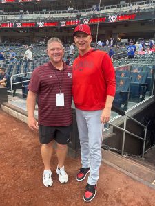 Fordham head baseball coach Kevin Leighton (left) with former Ram Ray Montgomery, interim manager of the Angels, at Citi Field