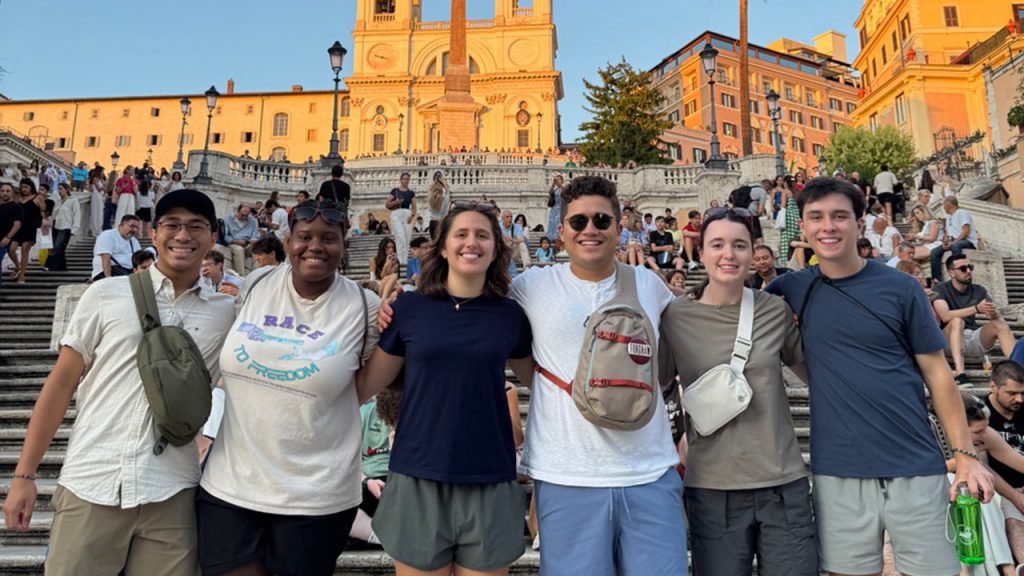 l to r: Fordham students Aidan Nanquil, Anne-Sophie Gray, and Gabriella Chinnici; Campus Ministry chaperone Augustine Preziosi; and Fordham students Genevieve Curoe and Jack O'Brien