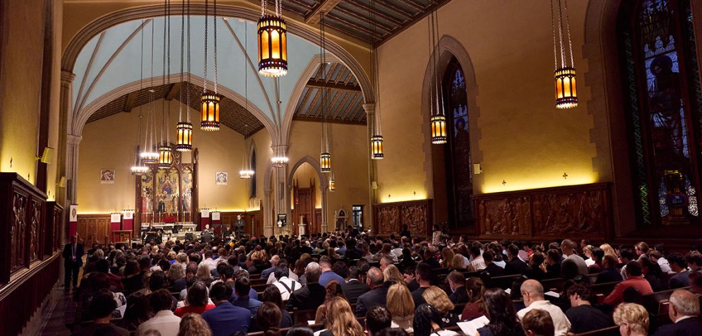 A view of the University church from the back, packed with people