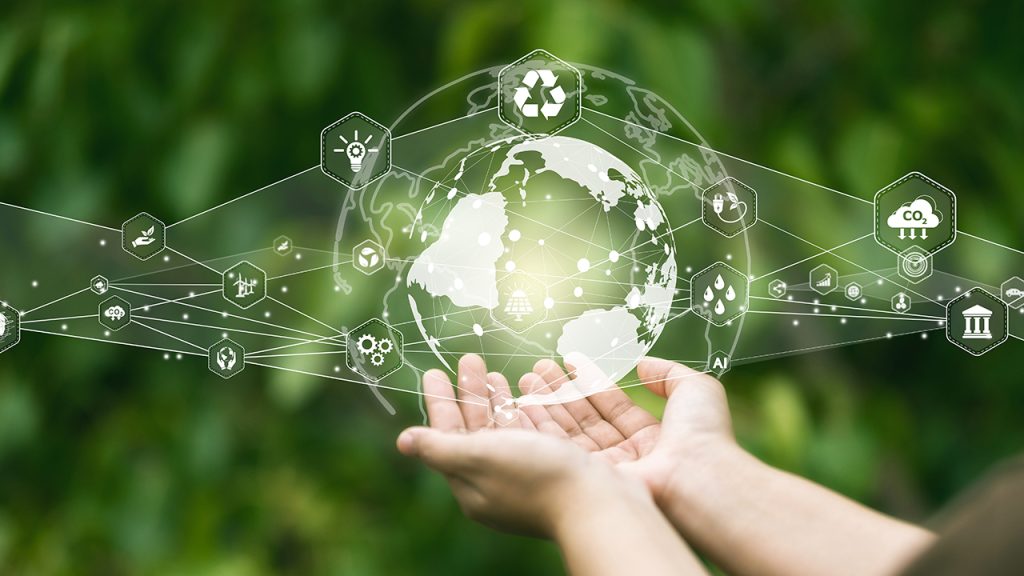 Weighing AI’s Environmental Trade-Offs Illustration of cupped hands, the earth, and electronic imagery