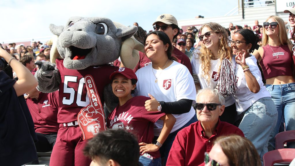 Fordham fans cheer at the homecoming football game.