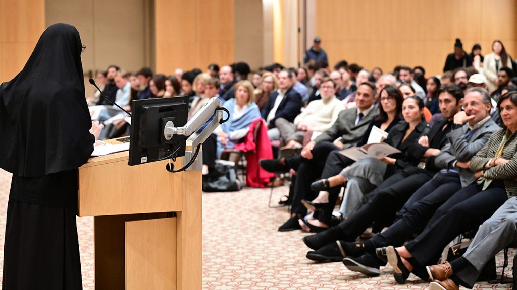 Sister Vassa Larin delivering the Economos Orthodoxy in America Lecture in the Great Hall at the McShane Campus Center.