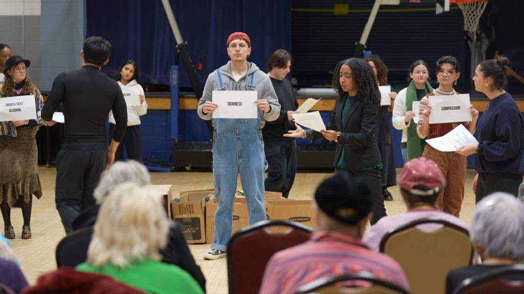 Fordham theater students performing in a gymnasium at Goddard Riverside, a community center near the Lincoln Center campus