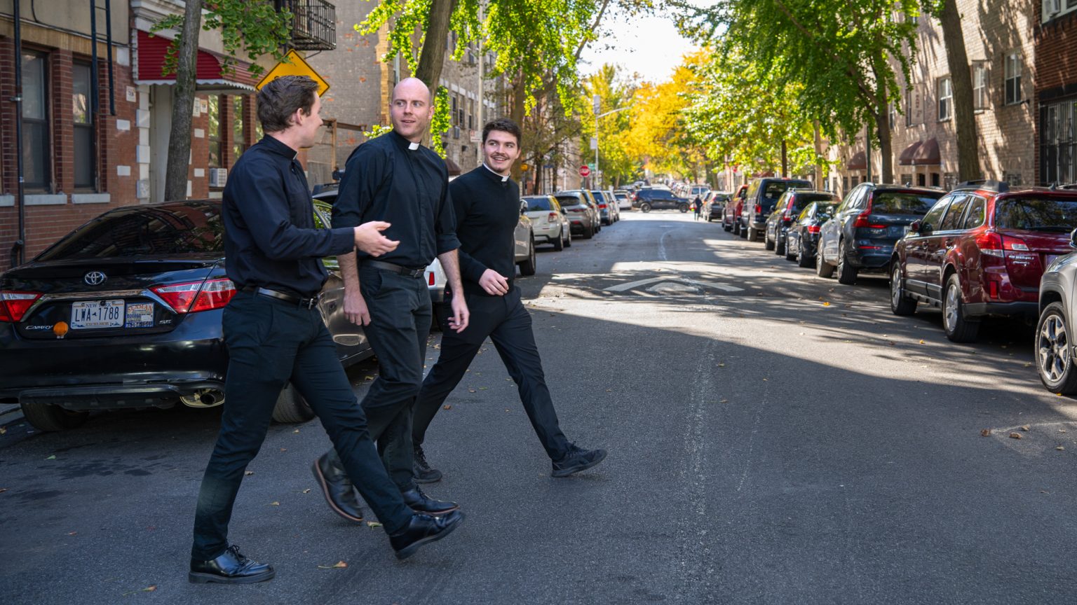 The Jesuit Way: Learning to Lead in the Heart of the Bronx Jesuit scholastics walk outside of Ciszek Hall