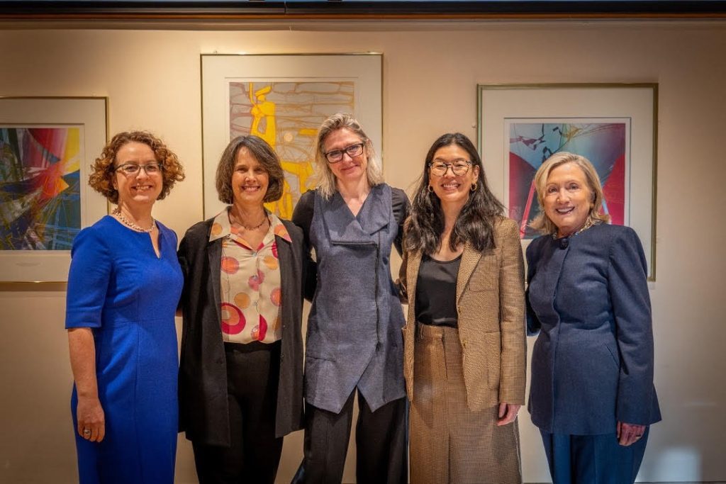 Fordham professor Kirsten Swinth poses with members of a "Politics of Care" discussion panel, including Hilary Clinton