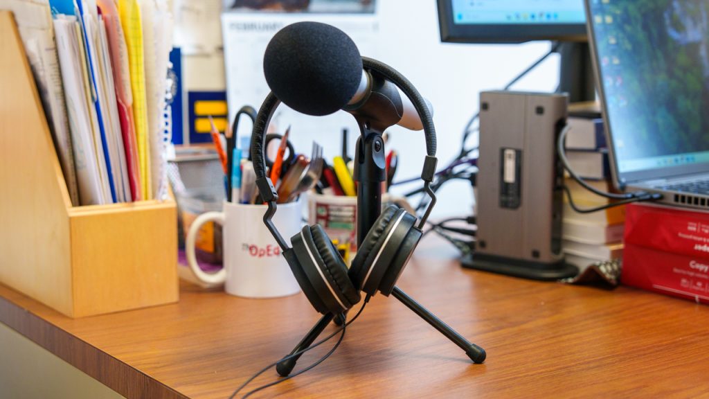 A microphone and headphones on a table