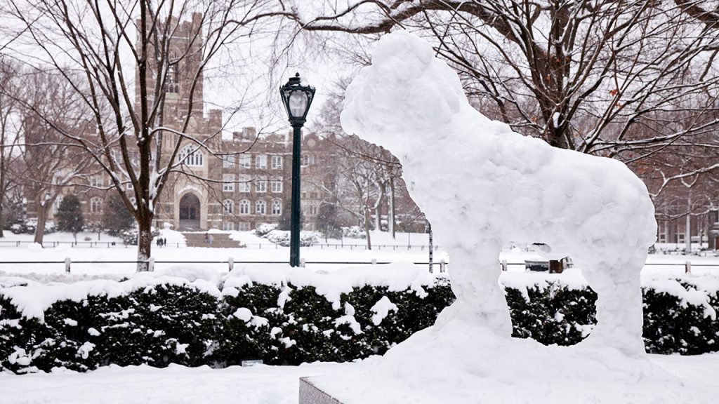 Snow covering Ram statue at Rose Hill campus