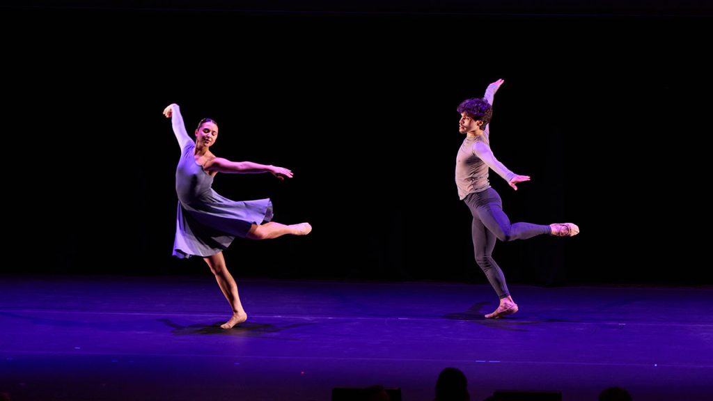 a man and woman dancer performing