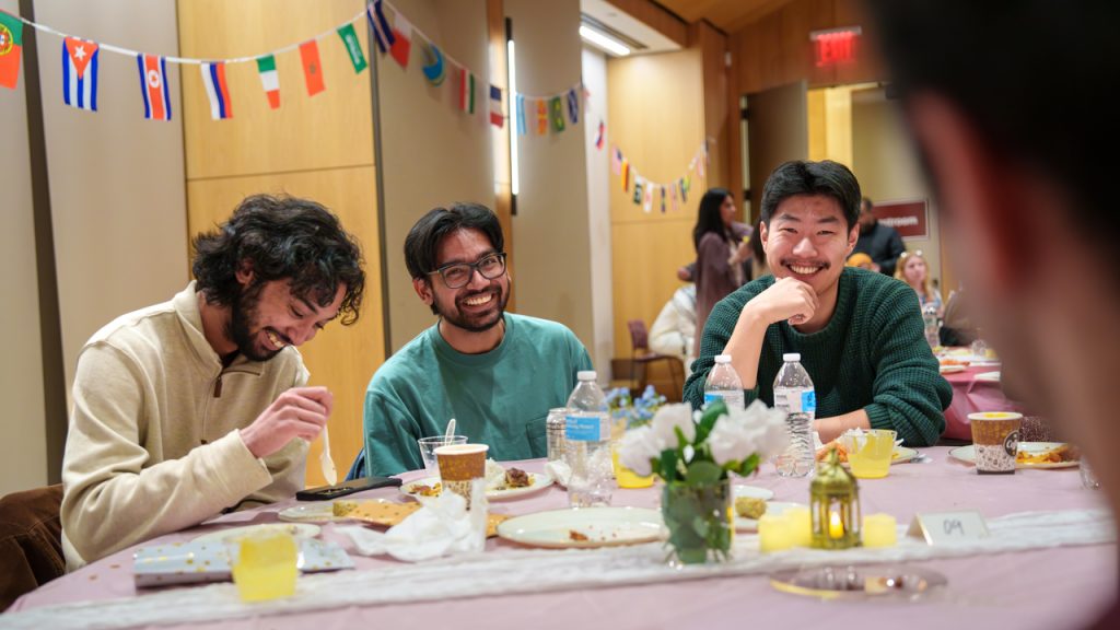 Fordham students observing Ramadan break their fast at a communal iftar dinner. Photo: Taylor Ha
