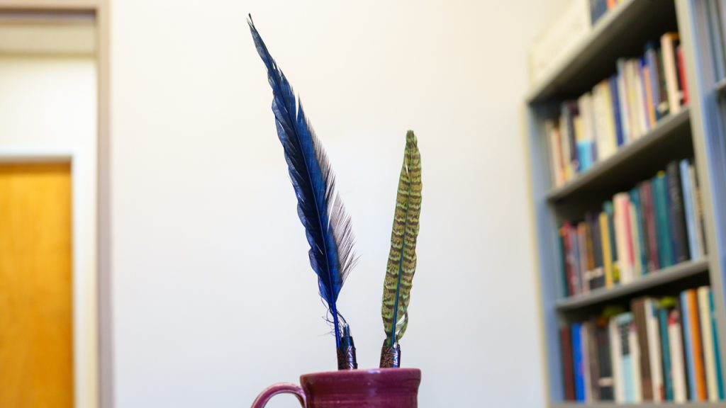 Two feathers in a mug