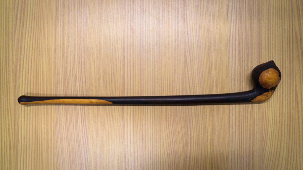 A staff resting on a table