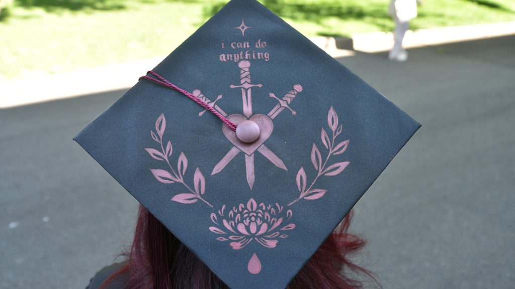 Commencement cap that says "I can do anything"