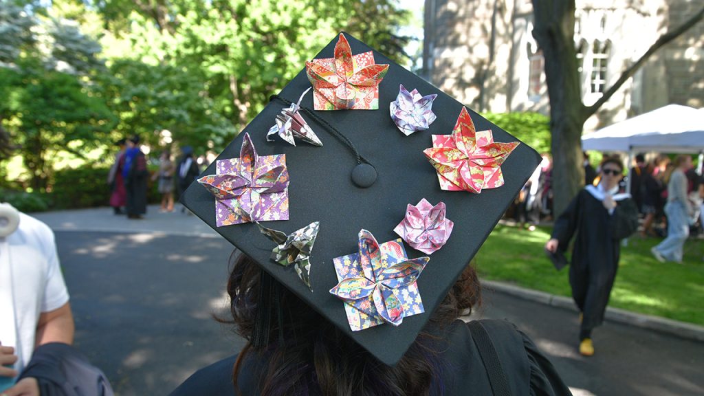 Commencement cap decorated with paper flowers