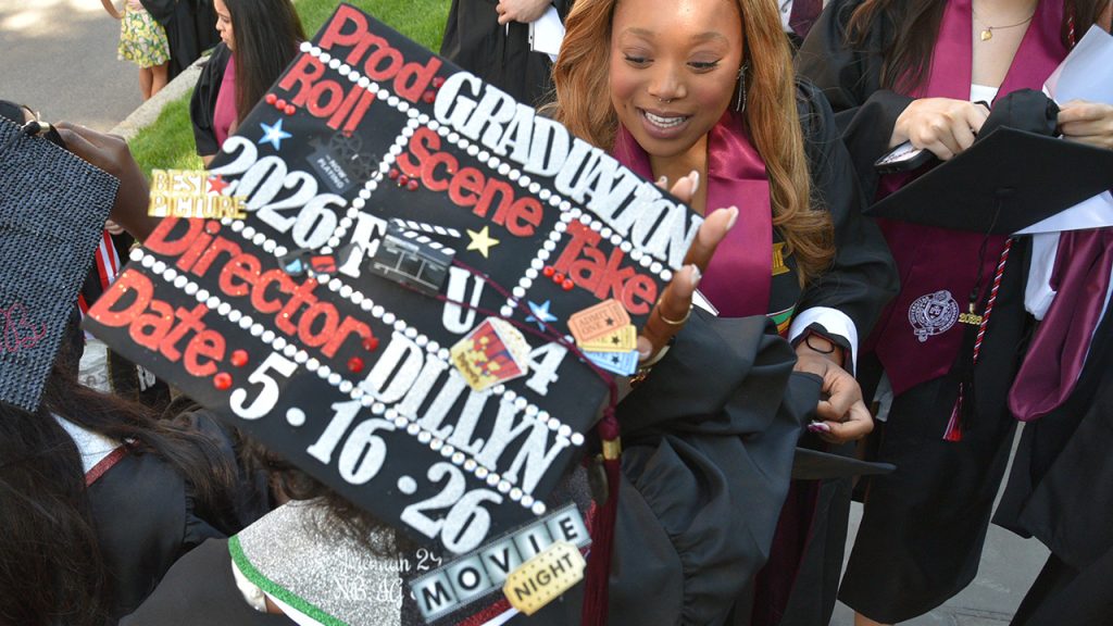 Commencement cap decorated to liken the ceremony to a movie production