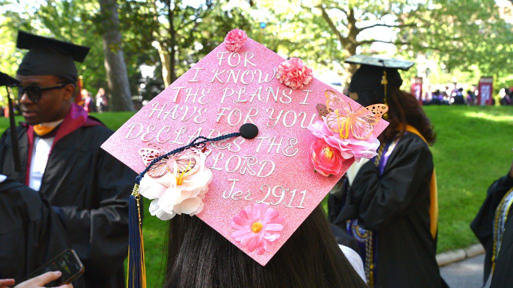 Commencement cap reading "For I know the plans I have for you, declares the Lord, Jer 29:11"