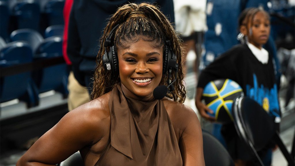How WNBA Broadcaster Isis “Ice” Young Found Her Calling Isis Young wearing headphones, smiling, and seated at a broadcast booth.