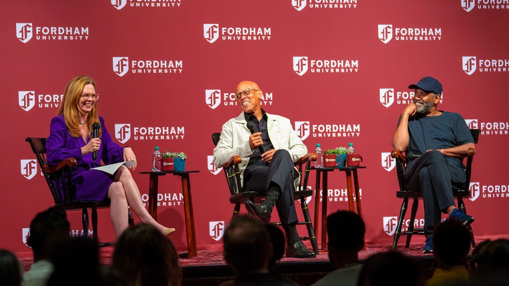 Denzel Washington and Anthony Carter on Finding Themselves at Fordham Fordham University President Tania Tetlow, recent Fordham trustee Anthony Carter, and actor Denzel Washington, a Fordham graduate, sit onstage in Pope Auditorium in front of a maroon Fordham backdrop during a panel discussion.