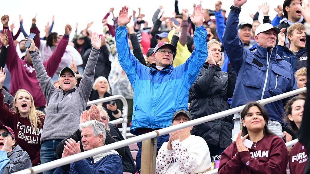 fans cheering in the stands Fordham Rose Hill